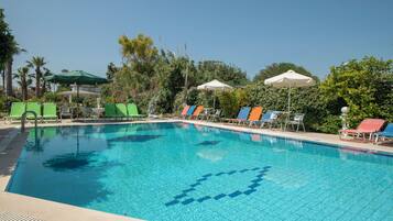 Seasonal outdoor pool, pool umbrellas