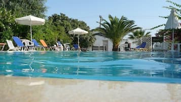 Seasonal outdoor pool, pool umbrellas