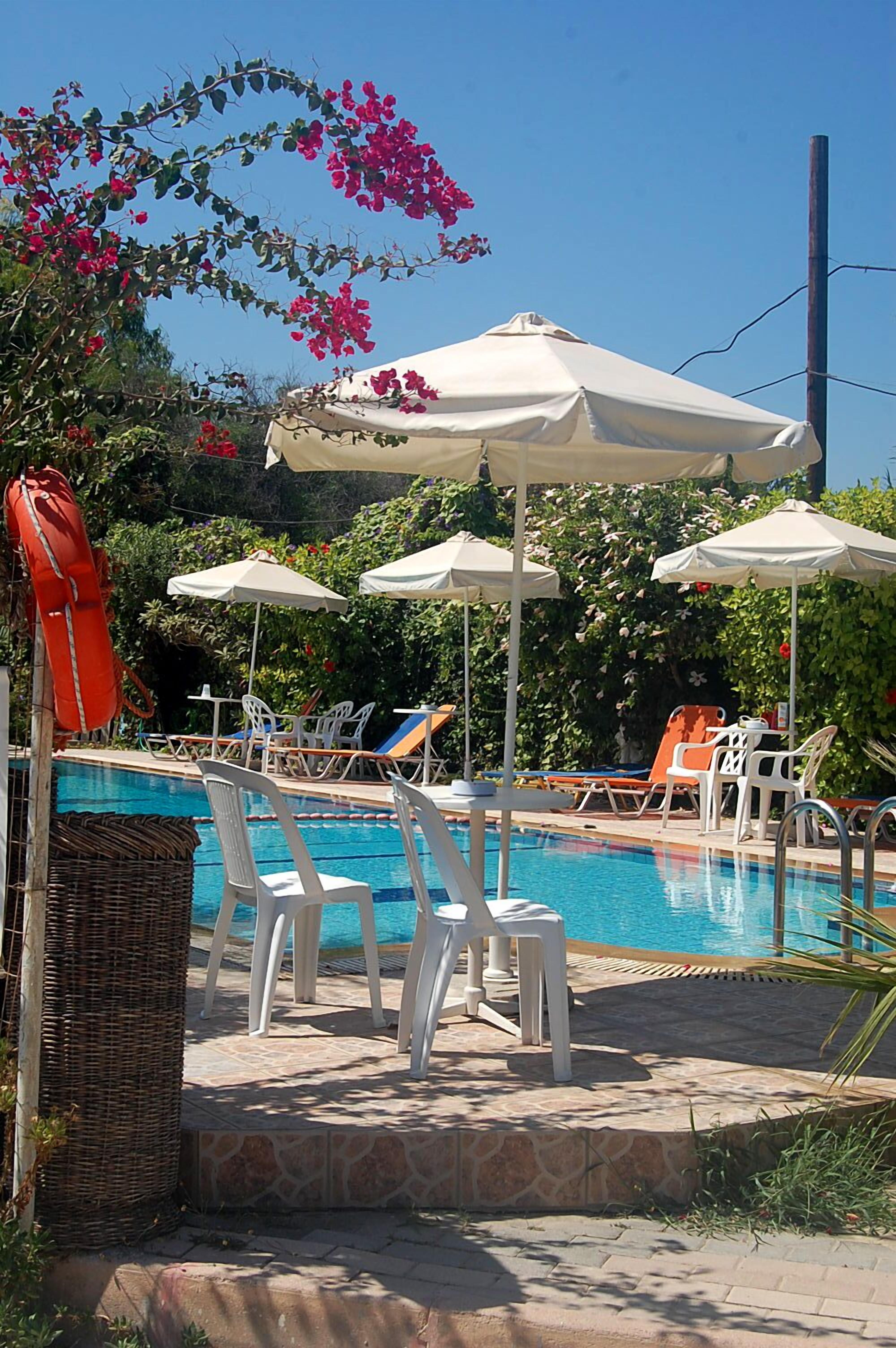 Seasonal outdoor pool, pool umbrellas
