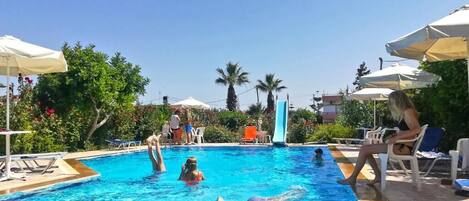 Seasonal outdoor pool, pool umbrellas