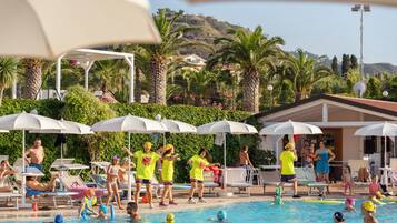 Seasonal outdoor pool, pool umbrellas, pool loungers