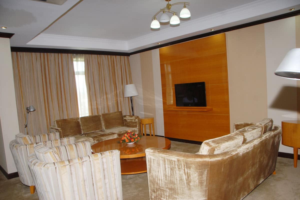 twin room, city view | living area | flat-screen tv