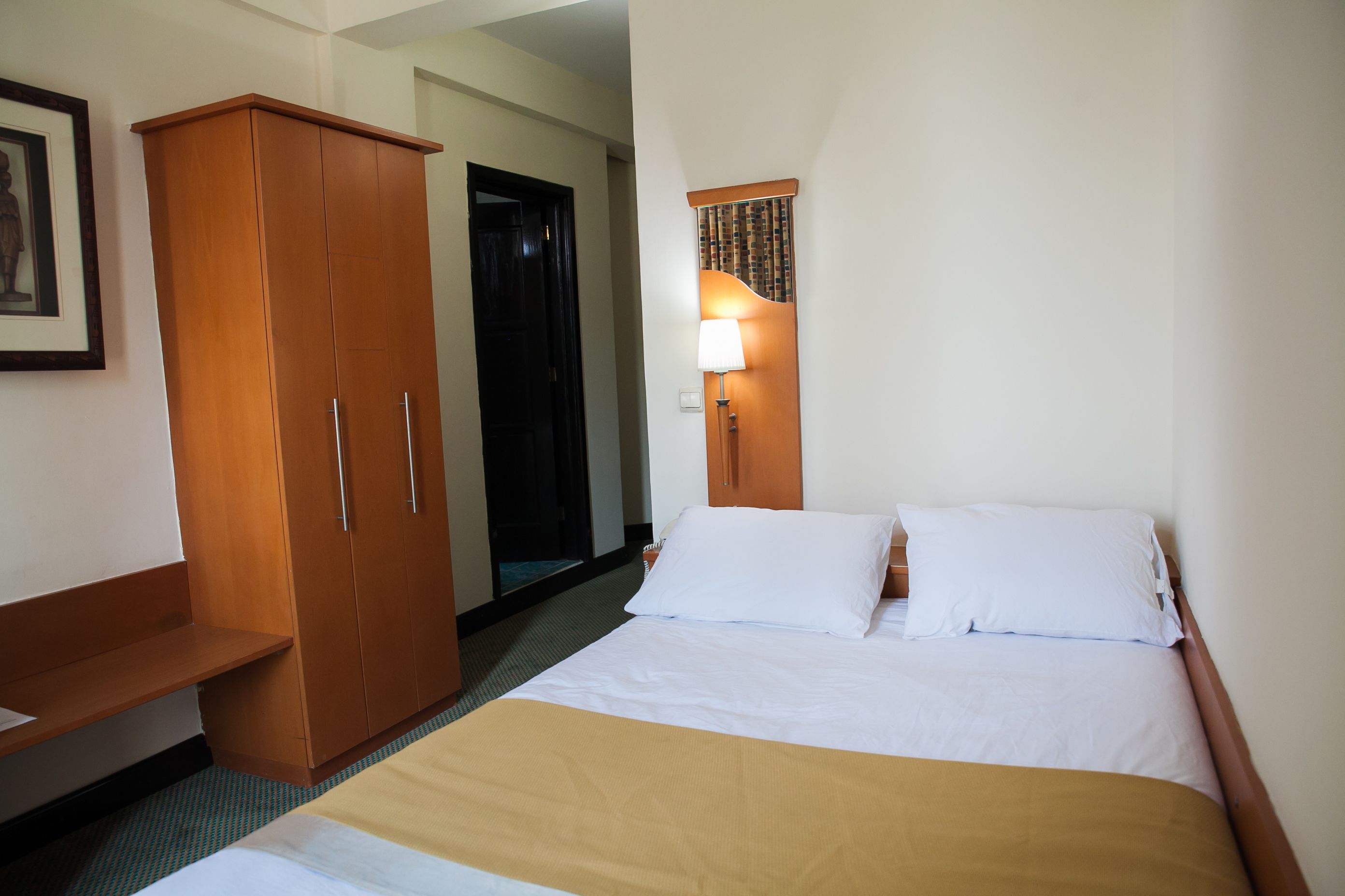 deluxe double room, city view | premium bedding, in-room safe, desk, free wifi