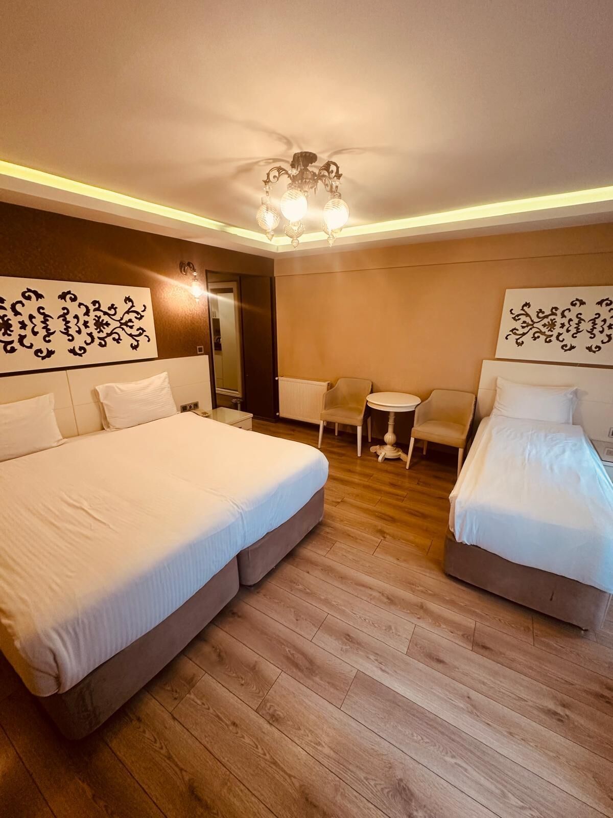 Superior Triple Room | Minibar, in-room safe, desk, soundproofing