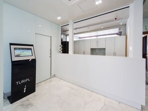 Check-in/check-out kiosk
