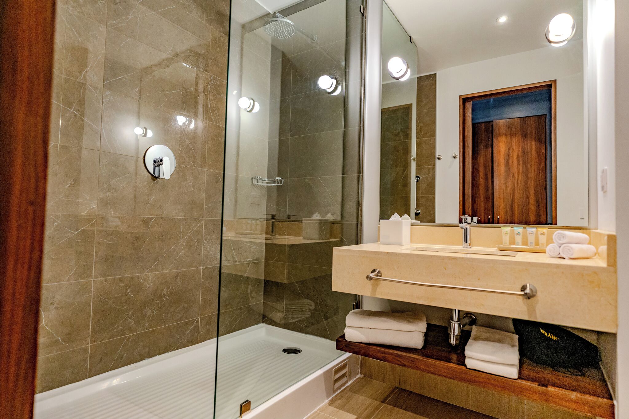 rainfall showerhead, hair dryer, towels, soap