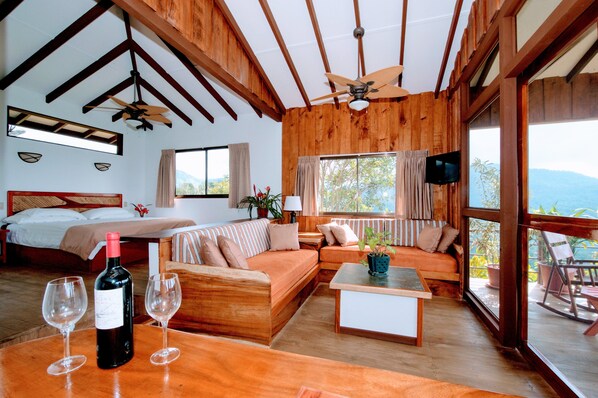 Casita Deluxe | Living area | 32-inch TV with cable channels - Santa Juana Lodge and Nature Reserve (Naranjito)