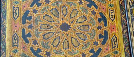 A detailed geometric pattern on a surface.