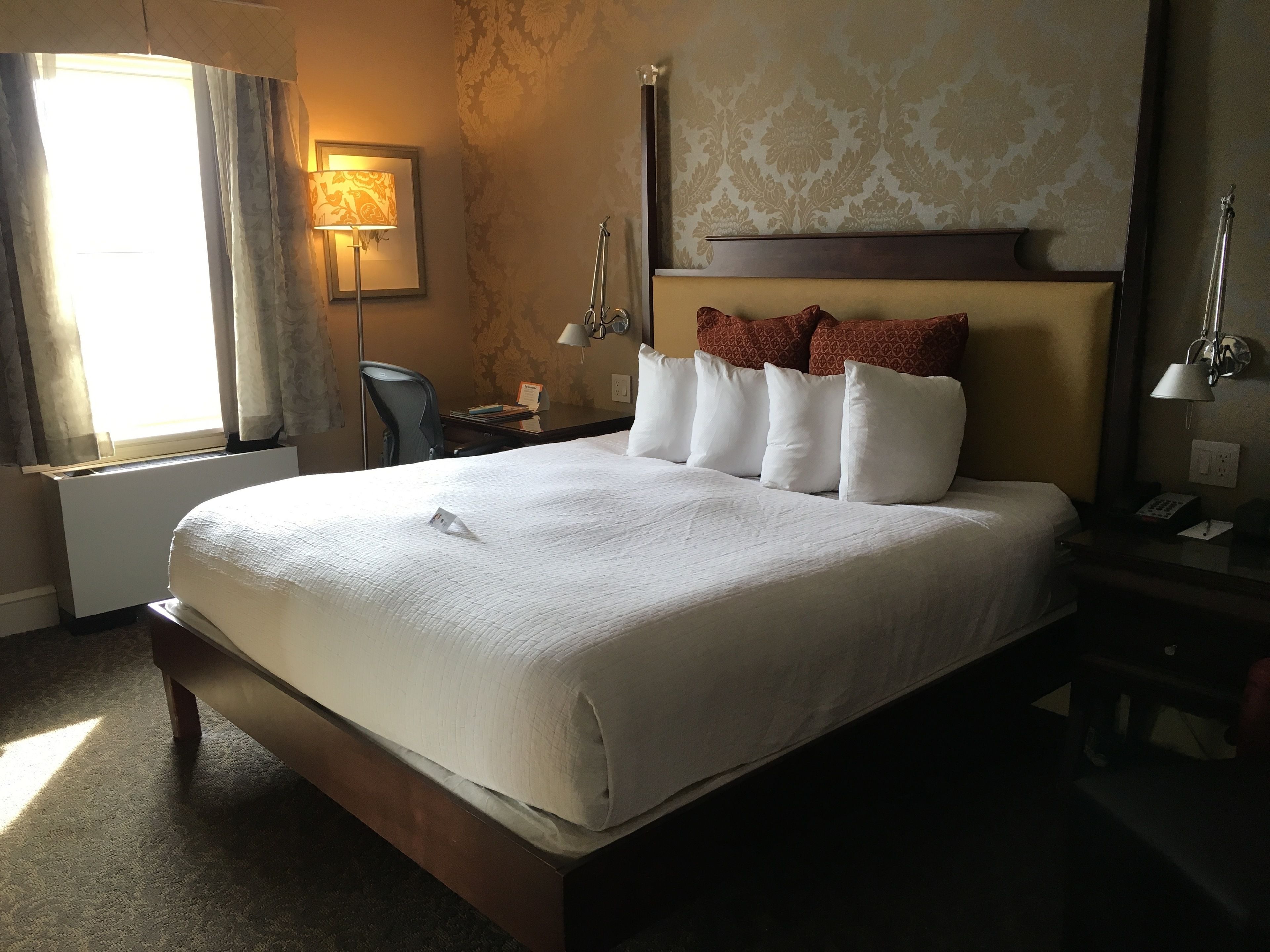 classic room, 1 queen bed | in-room safe, desk, laptop workspace, iron/ironing board