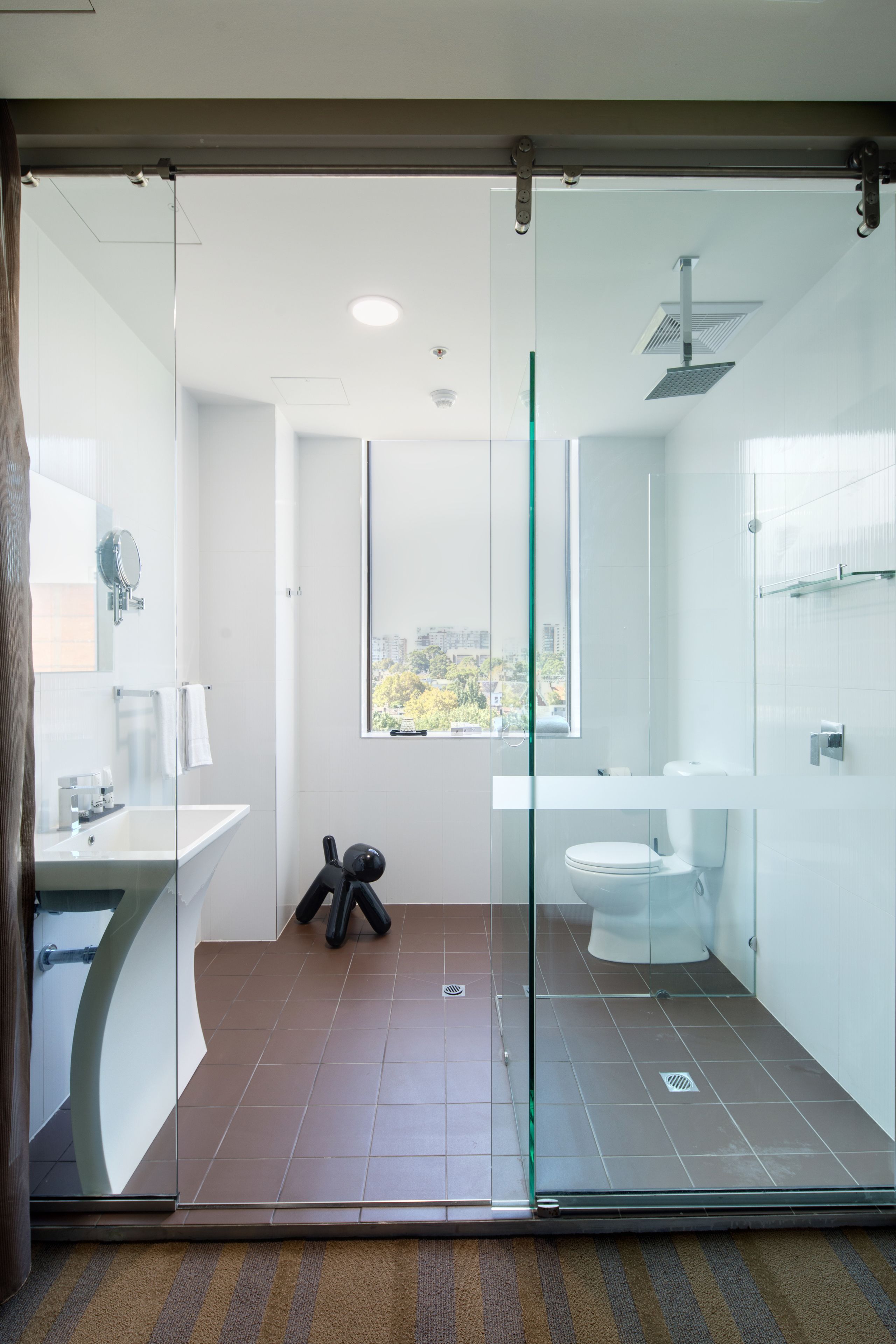 shower, designer toiletries, hair dryer, towels