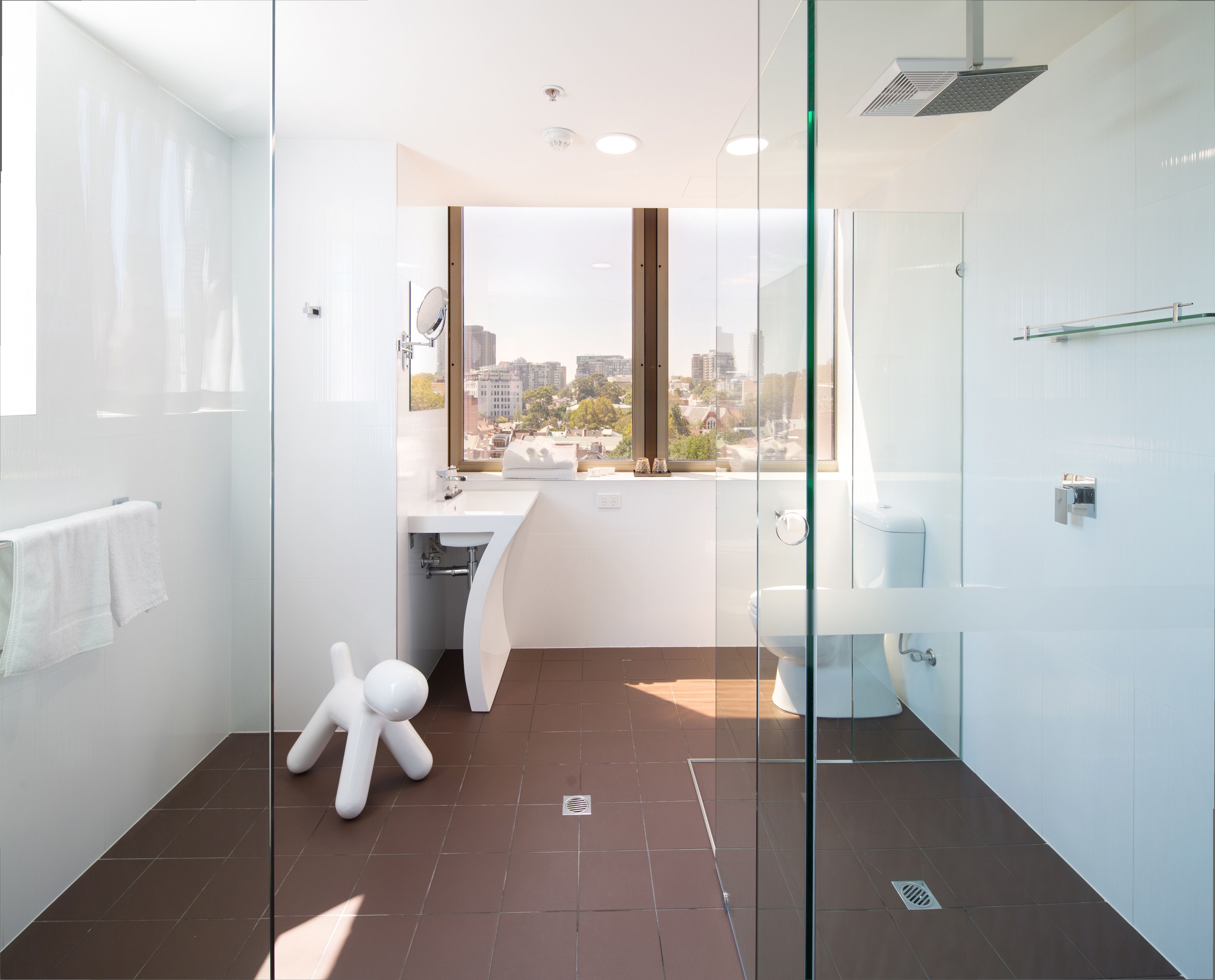 shower, designer toiletries, hair dryer, towels