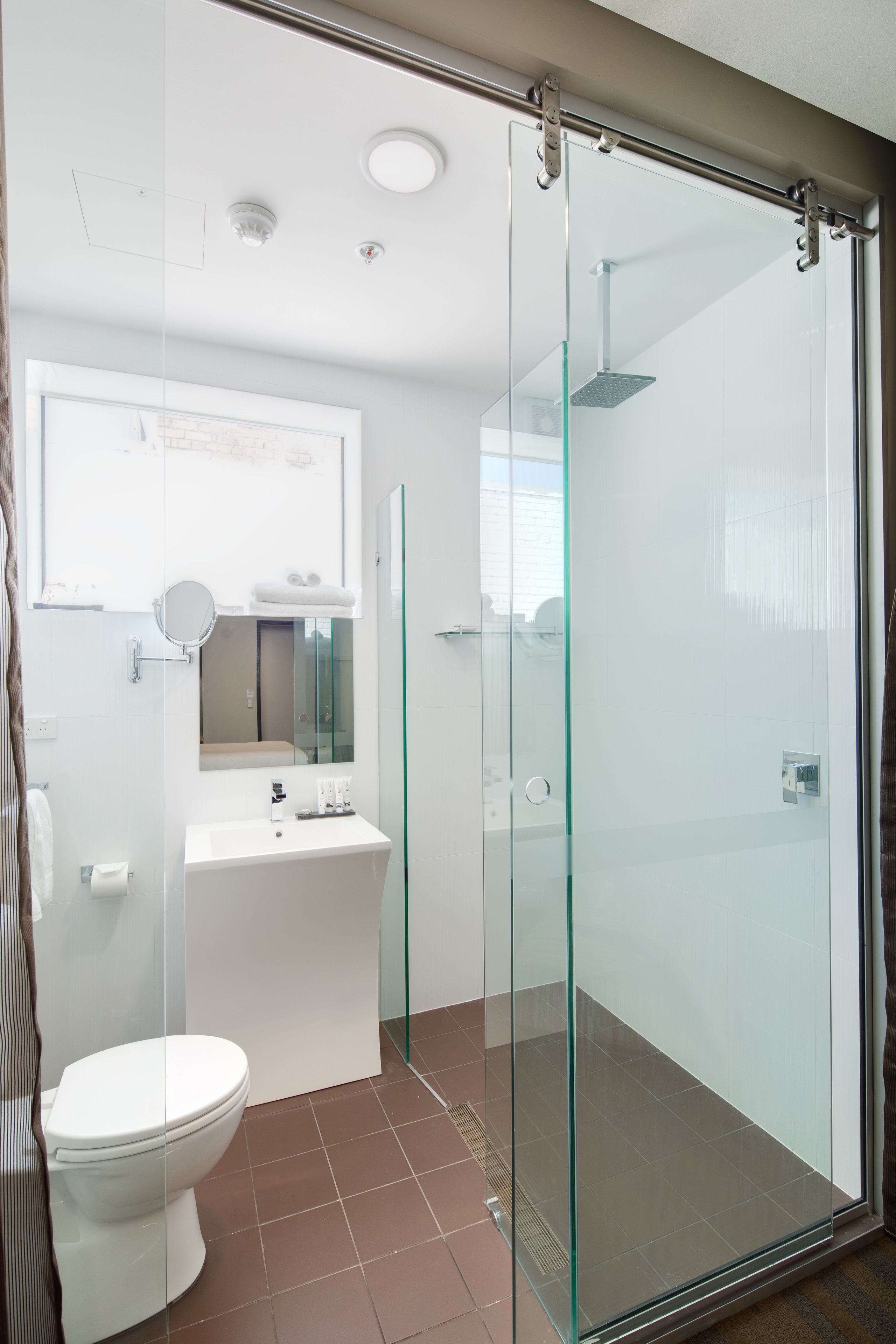 shower, designer toiletries, hair dryer, towels