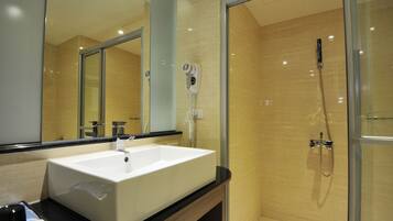 Shower, hair dryer, slippers, towels