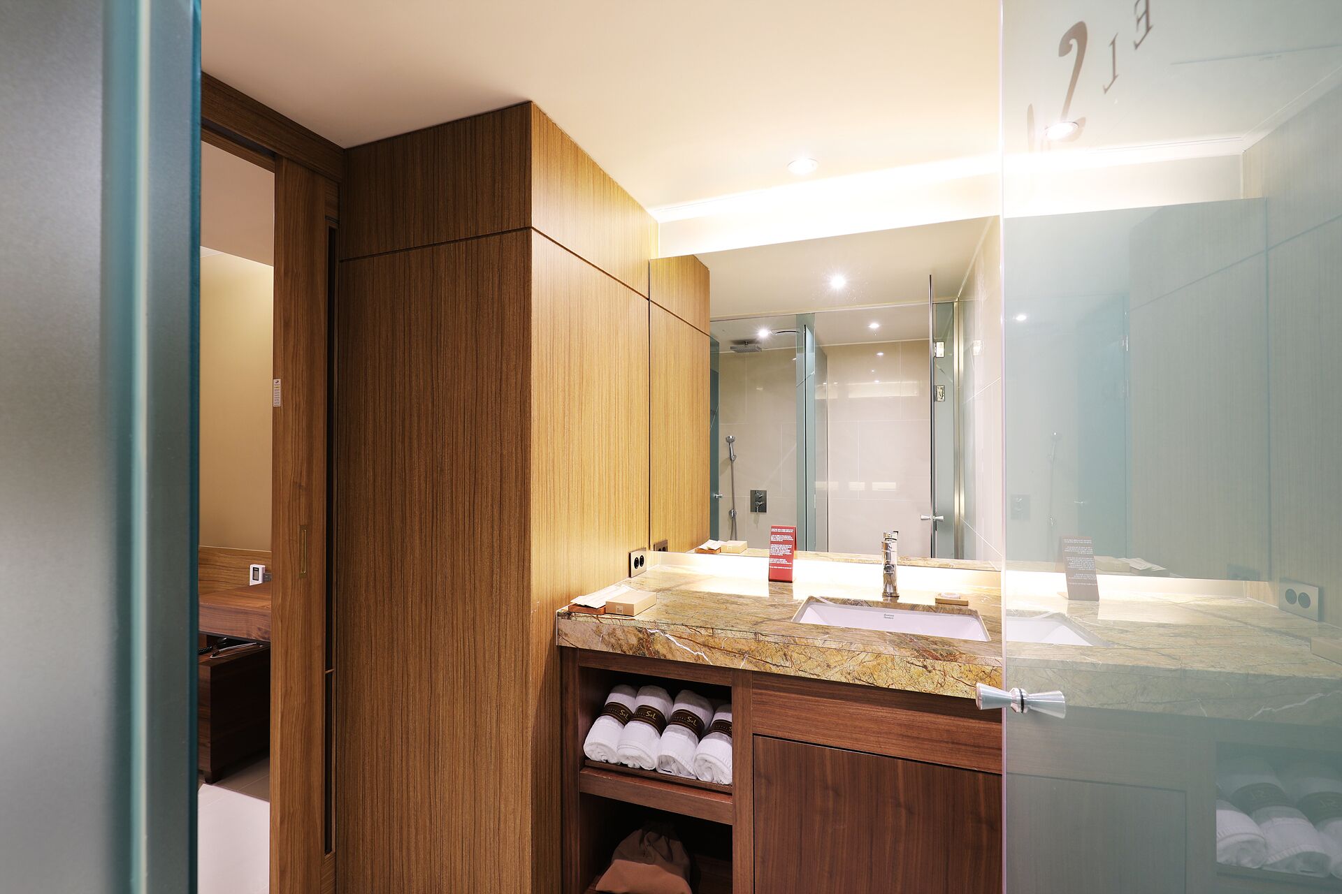 sol standard | bathroom | designer toiletries, hair dryer, bathrobes, slippers
