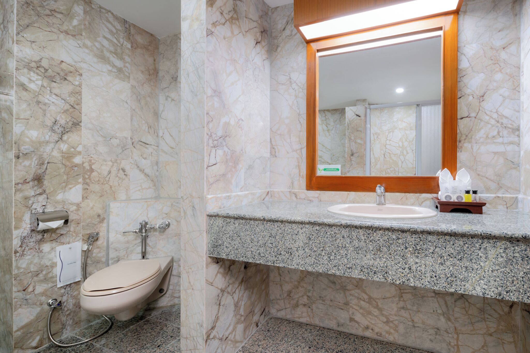 combined shower/bathtub, free toiletries, hair dryer, bathrobes