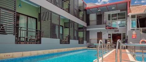 Outdoor pool, open 8:00 AM to 9:00 PM, sun loungers