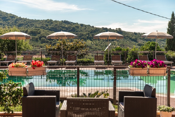 Seasonal outdoor pool, pool umbrellas, sun loungers