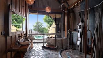 Bird's Nest Pool Villas | Bathroom | Separate bathtub and shower, deep-soaking bathtub, rainfall showerhead