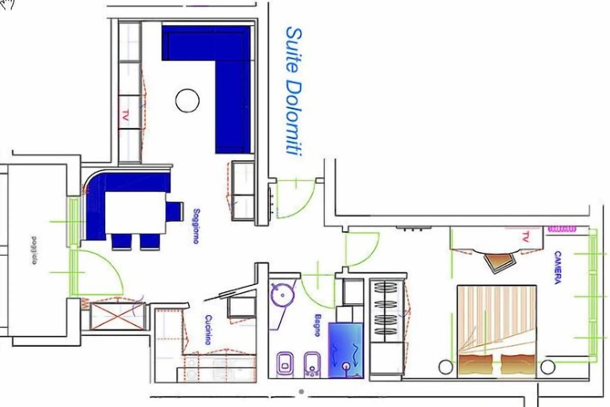 A floor plan of a hotel suite with a bathroom, a bedroom, a living area, and a kitchenette.