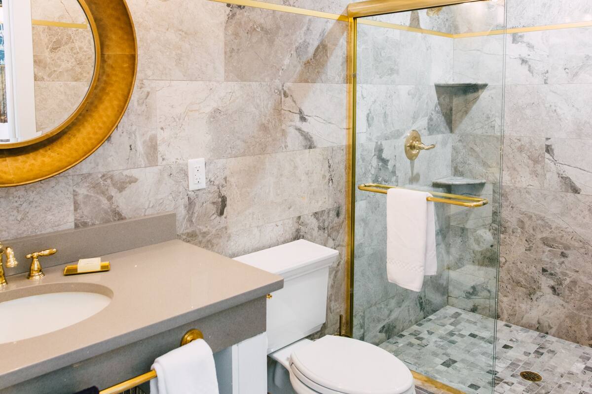 grand suite, 1 king bed with sofa bed, non smoking, city view | bathroom | free toiletries, hair dryer, towels, soap