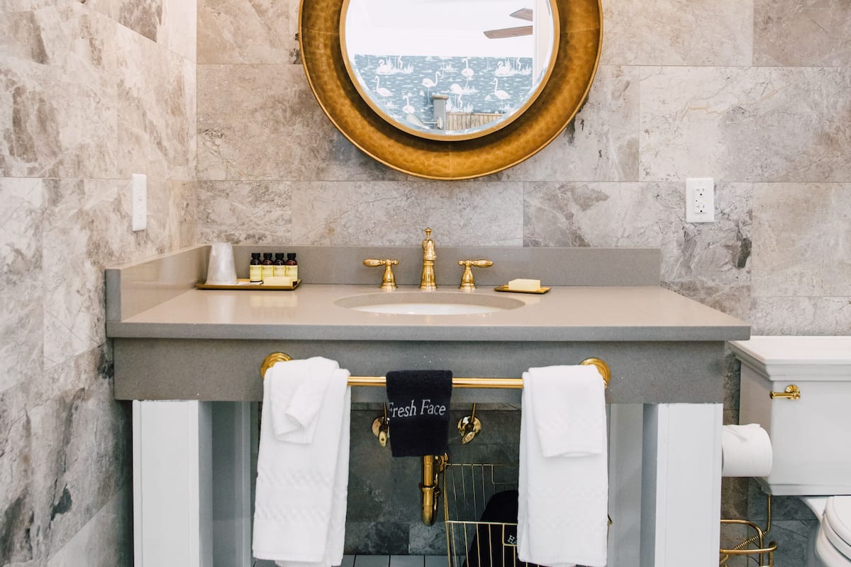 grand suite, 1 king bed with sofa bed, non smoking, city view | bathroom | free toiletries, hair dryer, towels, soap