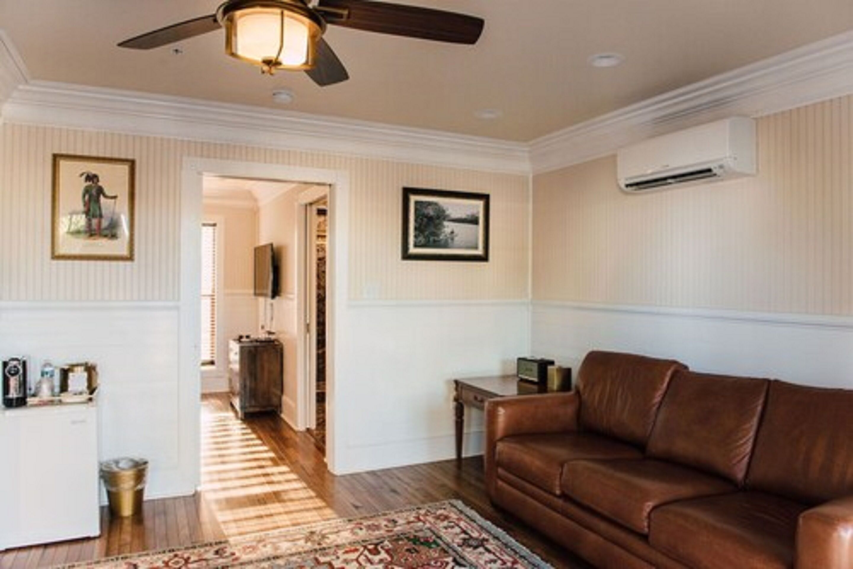 grand suite, 1 king bed with sofa bed, non smoking, city view | living area | 55-inch flat-screen tv with digital channels, tv