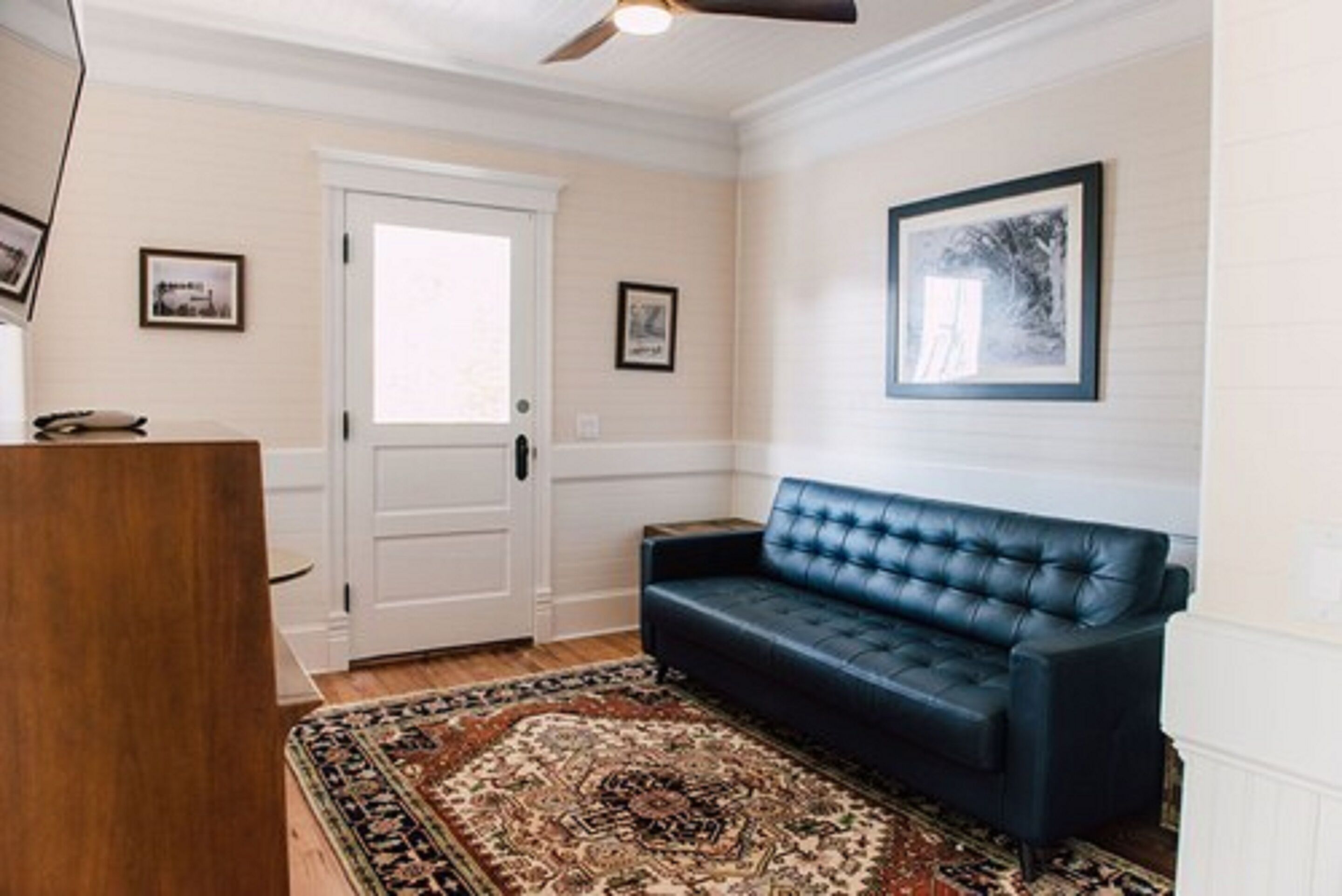 superior suite, 1 king bed with sofa bed, non smoking | living area | 55-inch flat-screen tv with digital channels, tv