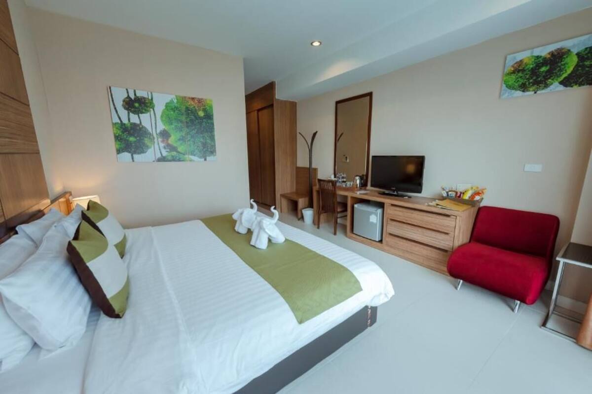 ห้องพรีเมียร์ดับเบิล, เตียงคิงไซส์ 1 เตียง | มินิบาร์, ตู้นิรภัยในห้องพัก, โต๊ะทำงาน, ผ้าม่านกันแสง
