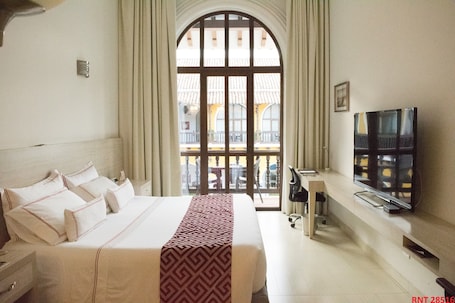 Habitación superior | Ropa de cama de alta calidad, minibar, escritorio y cunas gratuitas