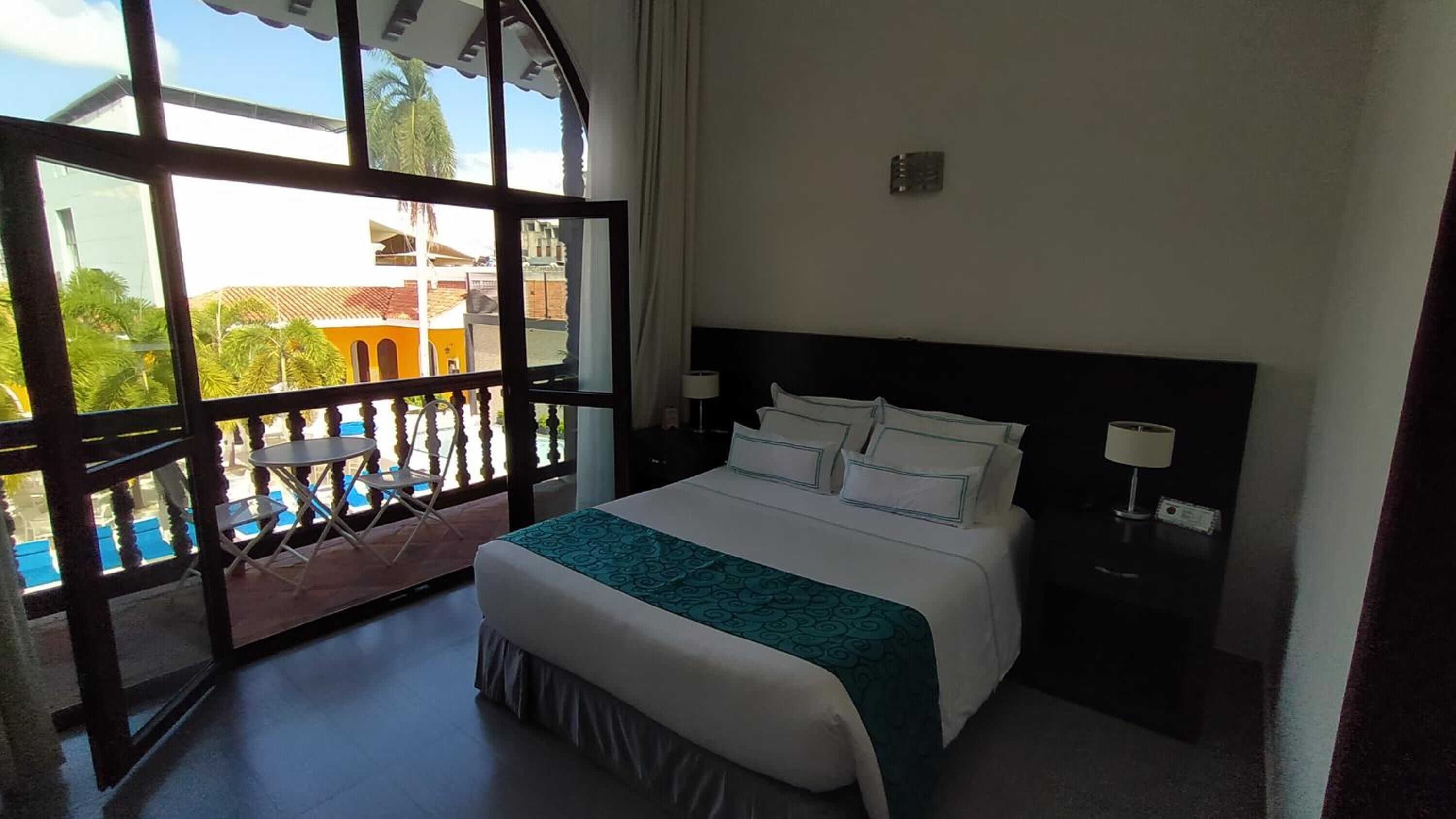 Premium bedding, minibar, desk, free cots/infant beds