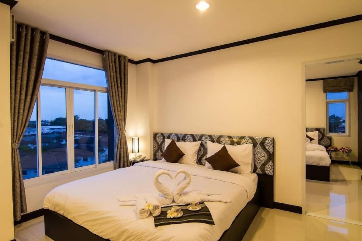 Ropa de cama de alta calidad, minibar y escritorio