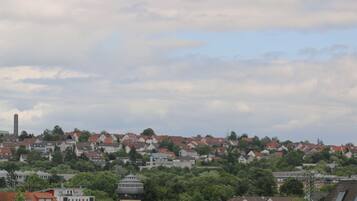A town with a mix of residential buildings and a prominent church steeple.