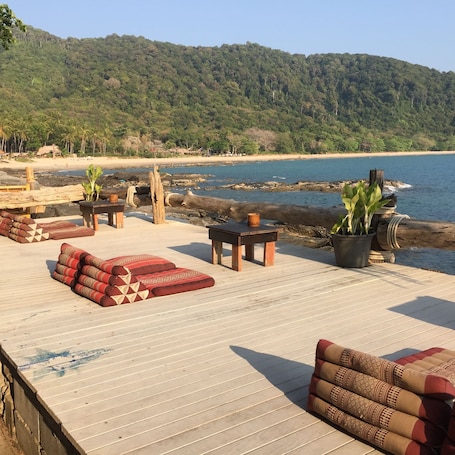 Terrace/patio. Bamboo Bay Resort