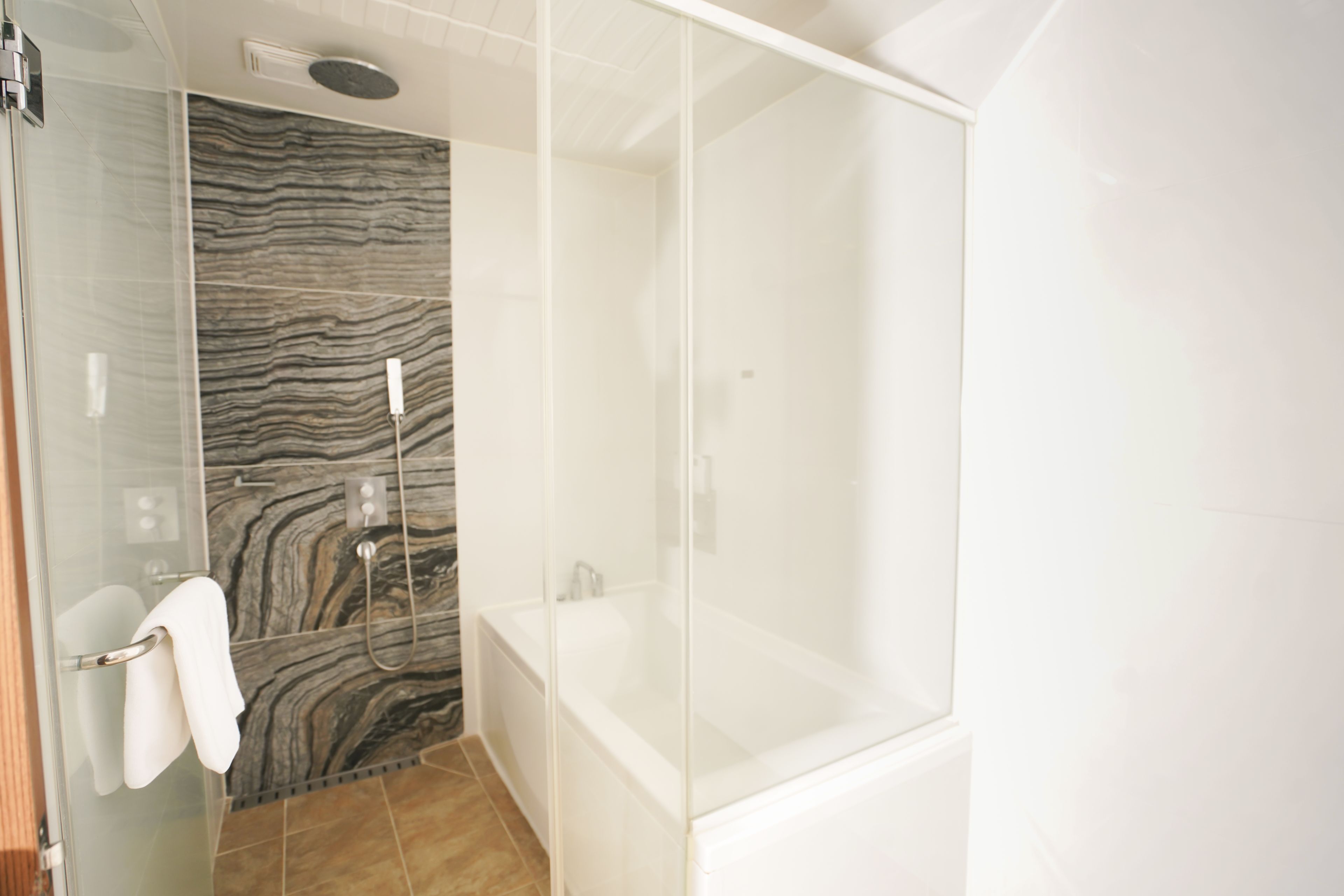 hair dryer, slippers, bidet, heated floors