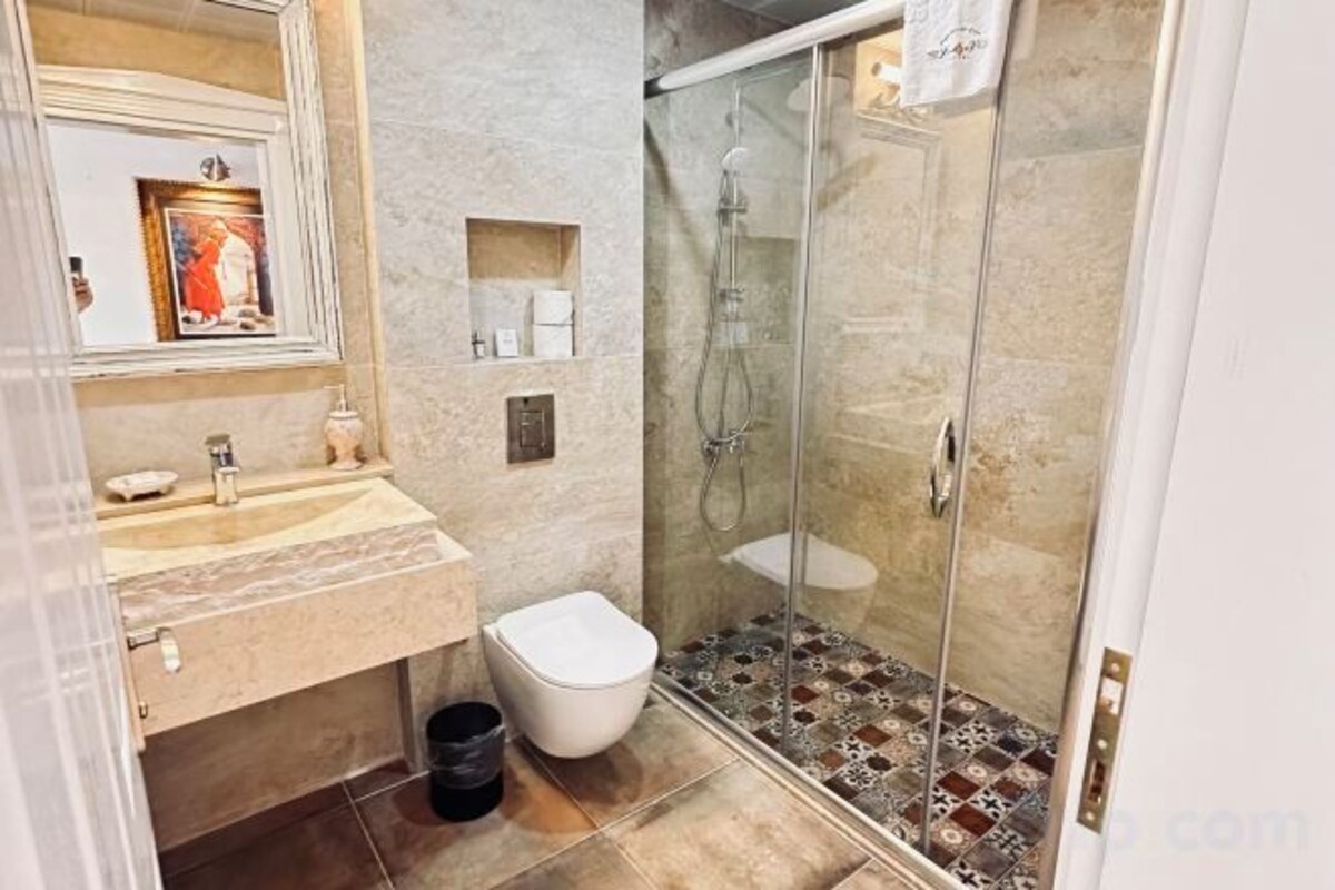 Bathroom | Shower, free toiletries, hair dryer, slippers