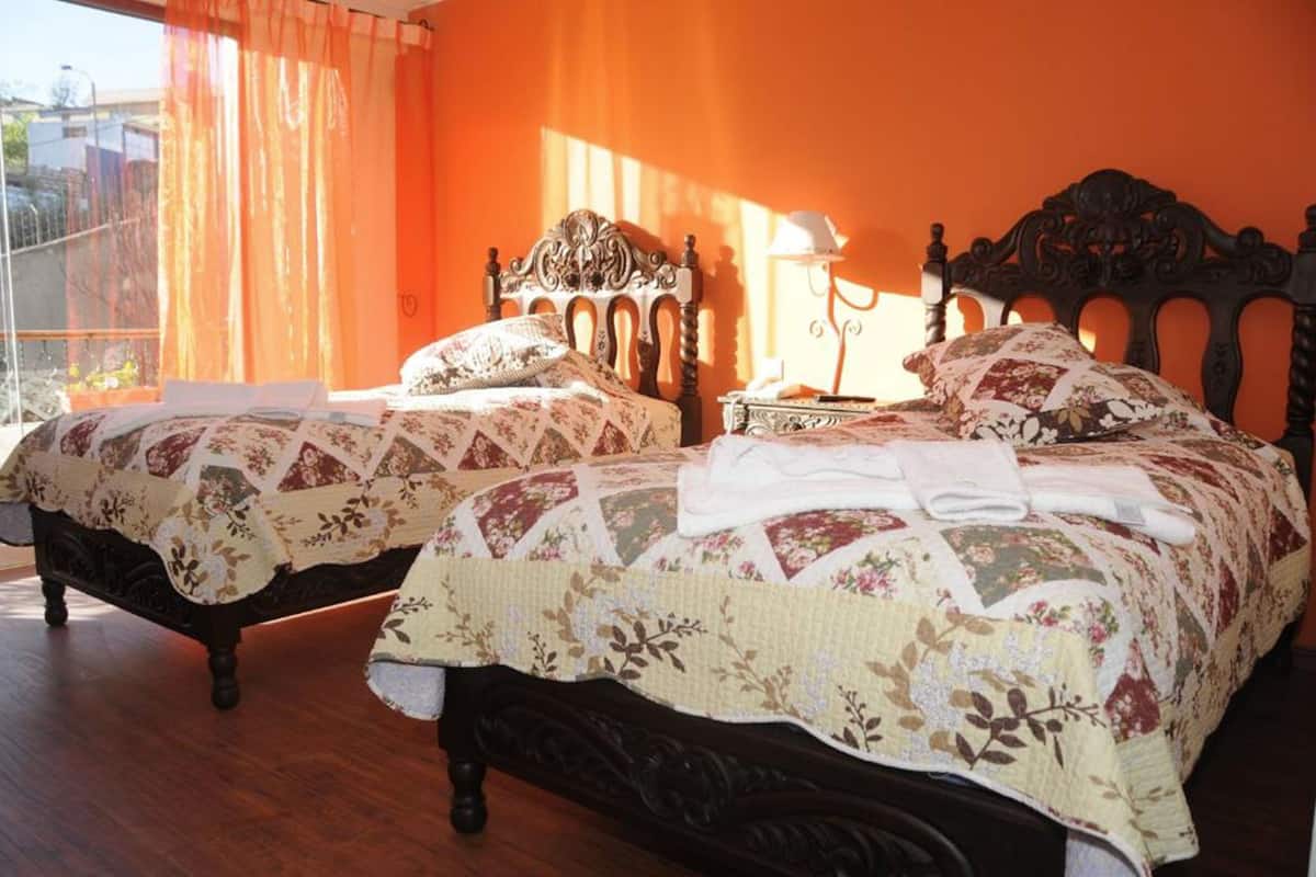 Twin Room | Minibar, in-room safe, desk, iron/ironing board