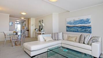 Apartment, 2 Bedrooms | Living room | 60-inch flat-screen TV with satellite channels, TV
