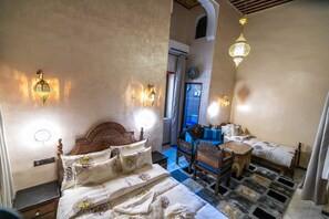 Standard Triple Room | Individually decorated, individually furnished, blackout drapes