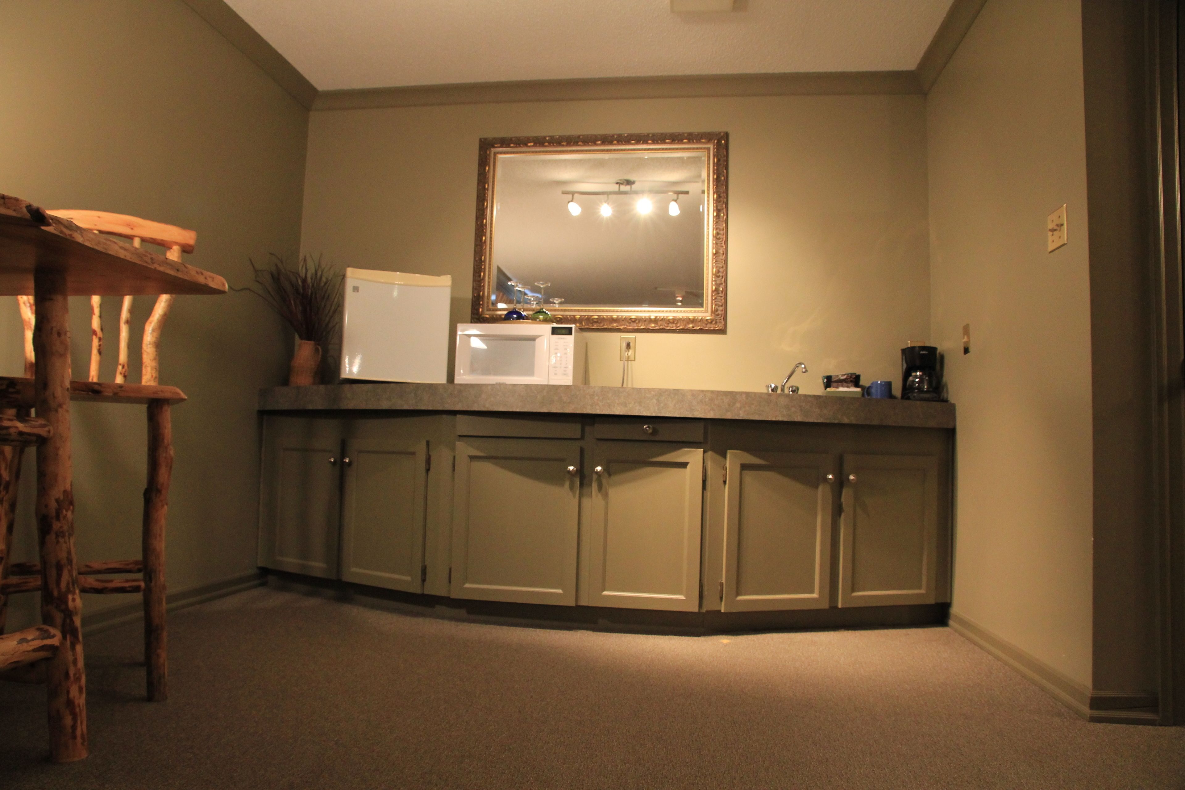 executive suite, 1 king bed (country style) | private kitchenette | fridge, microwave, coffee/tea maker, electric kettle