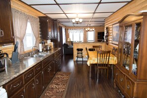 Vacation Home, 3 Bedrooms | Private kitchen | Fridge, microwave, stovetop, coffee/tea maker - Burnt Cape Cabins (Raleigh)