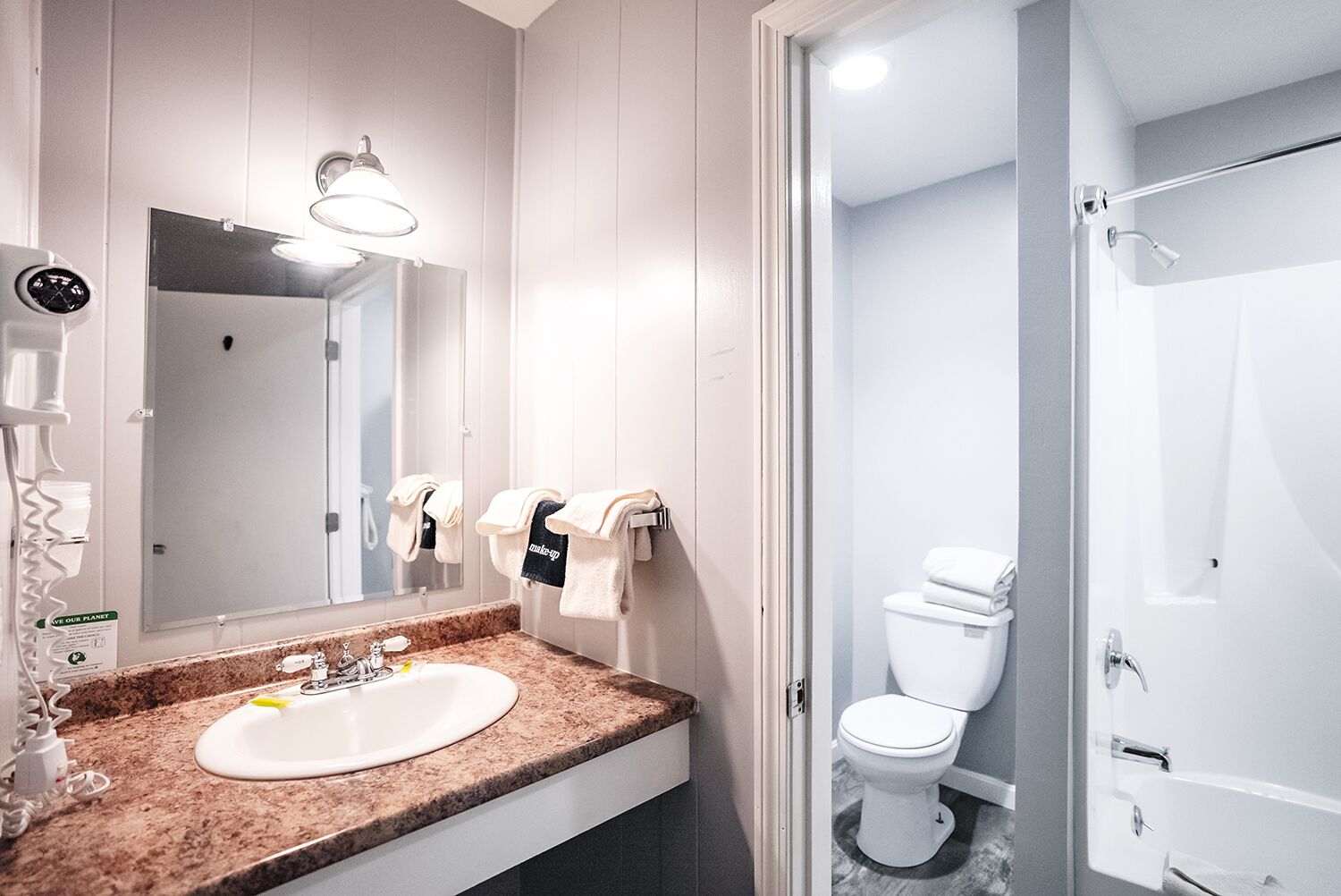 king room 206 partial mountain view (second floor) | bathroom | hair dryer, towels, soap, shampoo