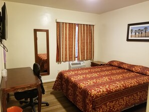 Desk, iron/ironing board, bed sheets - Lido Hotel (Huntington Park)