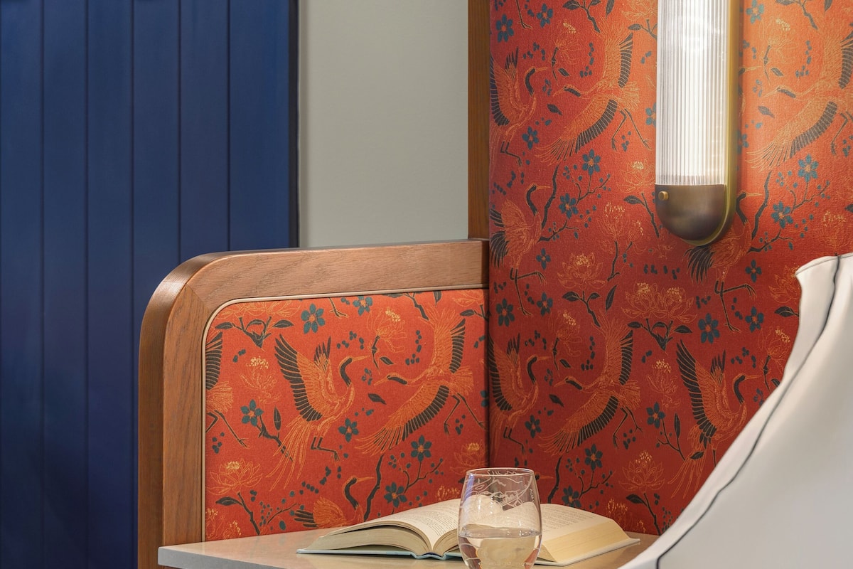 Desk, laptop workspace, iron/ironing board, free cots/infant beds