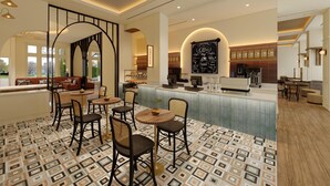 Un café moderno con barra, mesas y sillas redondas, y una pared con la carta de café.
