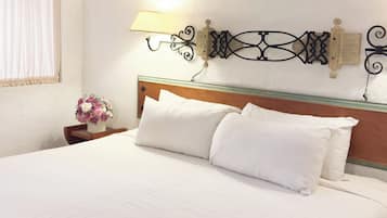 Habitación superior, 1 cama King size | Ropa de cama de alta calidad y edredón