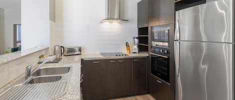 Departamento, 2 habitaciones | Cocina privada | Cafetera y tetera