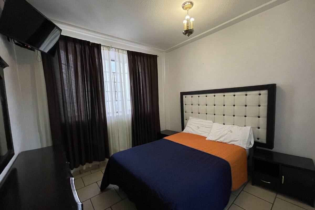 Desk, free WiFi, bed sheets