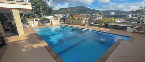Outdoor pool, pool umbrellas, pool loungers