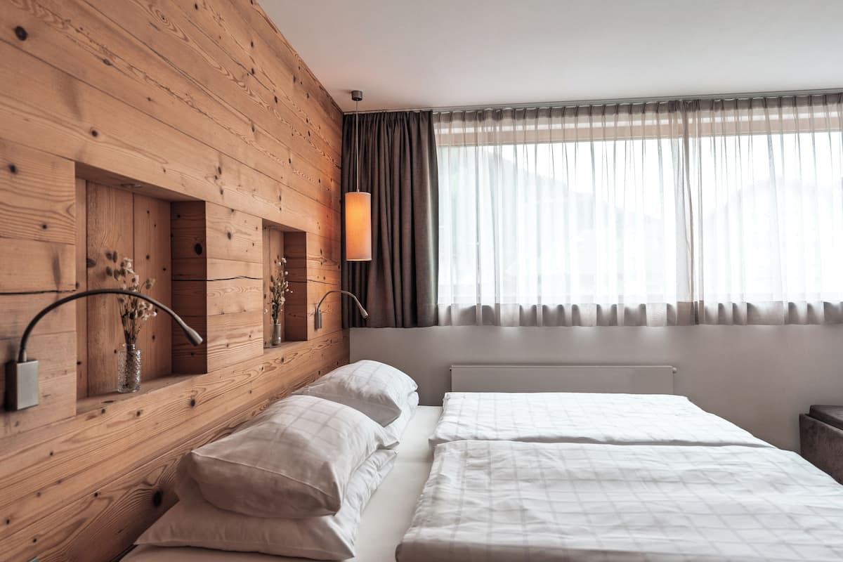 Edredón, camas Select Comfort y minibar