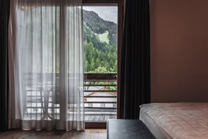 Premium Triple Room, Multiple Beds, Mountain View, Slope side | 1 bedroom, down comforters, Select Comfort beds, minibar